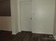An empty room featuring dark, hardwood floors at 1502 Mulberry Ridge Dr # 1, Newton, NC 28658