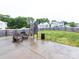 Backyard featuring an outdoor seating area, privacy fence and large yard at 1523 Loropetalum Rd, Charlotte, NC 28215
