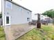 Backyard patio with built-in seating and access to green space at 1523 Loropetalum Rd, Charlotte, NC 28215