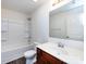Bathroom featuring a bathtub and shower, a single sink vanity, and a commode at 1523 Loropetalum Rd, Charlotte, NC 28215