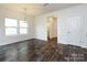 Bright dining room features hardwood floors, ample natural light, and neutral colors at 1523 Loropetalum Rd, Charlotte, NC 28215
