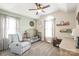 Cozy bedroom with vaulted ceiling, ceiling fan, and decorative wall accents at 1542 Crowders Woods Dr, Gastonia, NC 28052
