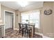 Breakfast nook featuring a wooden table, two chairs, and a window with natural light at 1542 Crowders Woods Dr, Gastonia, NC 28052