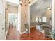 Inviting foyer with wood floors leading to living room, providing a warm transition into the home's living spaces at 1542 Crowders Woods Dr, Gastonia, NC 28052