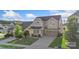 Inviting two-story home with a covered porch, two-car garage, and well-maintained landscaping at 16134 Kelby Cv, Charlotte, NC 28278