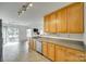 Functional kitchen with natural wood cabinetry and updated lighting at 1835 Montague Rd, Clover, SC 29710