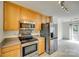 Kitchen featuring stainless steel appliances, tile flooring and access to the backyard at 1835 Montague Rd, Clover, SC 29710