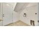 Laundry room with tile floor, storage shelf, and exterior access at 1835 Montague Rd, Clover, SC 29710