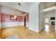 Open-concept living room showcasing hardwood floors and large entryways at 1835 Montague Rd, Clover, SC 29710
