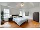Relaxing main bedroom features hardwood floors, tray ceiling, and large windows at 1835 Montague Rd, Clover, SC 29710