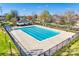 A spacious outdoor swimming pool with lounge chairs and manicured landscaping offers a relaxing environment at 1835 Montague Rd, Clover, SC 29710