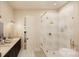 A modern bathroom featuring a glass-enclosed shower and double vanity sinks with luxury fixtures at 1905-A Bechtler Rd, Edgemoor, SC 29712