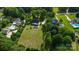 Aerial view of a neighborhood featuring homes with pools and lush landscaping on spacious lots at 1920 Williford Woods Ln # 5, Rock Hill, SC 29730