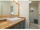 Modern bathroom boasts wood counters and a stylish shower with white subway tile at 1920 Williford Woods Ln # 5, Rock Hill, SC 29730