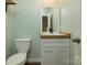 This charming bathroom has a modern vanity and a toilet at 1920 Williford Woods Ln # 5, Rock Hill, SC 29730