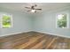 This bedroom features two windows that provide great natural light at 1920 Williford Woods Ln # 5, Rock Hill, SC 29730