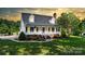 Charming two-story home with a welcoming front porch and beautifully landscaped front yard at 1920 Williford Woods Ln # 5, Rock Hill, SC 29730
