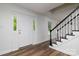 Inviting foyer with hardwood floors, staircase, and plenty of natural light at 1920 Williford Woods Ln # 5, Rock Hill, SC 29730
