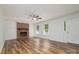 Spacious living room featuring hardwood floors, a brick fireplace, and lots of natural light at 1920 Williford Woods Ln # 5, Rock Hill, SC 29730