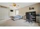 Bedroom featuring a ceiling fan, TV, and dedicated desk/work space at 305 Phillip Dr, Salisbury, NC 28146