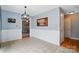 Bright dining area featuring tiled floors and detailed wainscoting at 305 Phillip Dr, Salisbury, NC 28146