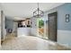 Bright dining area featuring tiled floors and a sliding glass door for access to the outside at 305 Phillip Dr, Salisbury, NC 28146