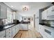 Traditional style eat-in kitchen with white cabinetry and an open design at 305 Phillip Dr, Salisbury, NC 28146