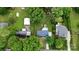 Aerial view of property showcasing the backyard, roof and proximity to neighborhood at 324 Autumn Dr, Harrisburg, NC 28075