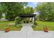 Charming backyard pergola with patio area, ideal for outdoor dining and enjoying the serene surroundings at 324 Autumn Dr, Harrisburg, NC 28075