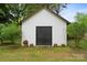 Well-maintained storage shed in backyard, providing ample space for tools, equipment, and outdoor storage at 324 Autumn Dr, Harrisburg, NC 28075