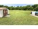 Large backyard with storage shed and above ground pool at 3300 Luke Ct, Monroe, NC 28112