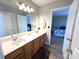 Bathroom featuring double sinks and spacious counters for added functionality and convenience at 3300 Luke Ct, Monroe, NC 28112