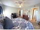 Relaxing bedroom featuring a ceiling fan and a dedicated workspace for added functionality and convenience at 3300 Luke Ct, Monroe, NC 28112