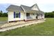 Attractive single-story home with blue shutters and a well-maintained lawn at 3300 Luke Ct, Monroe, NC 28112