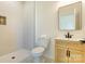 Stylish bathroom featuring tiled shower, a modern vanity, and neutral color palette at 3300 Travis Nw Ln, Concord, NC 28027