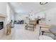 Bright open concept living room featuring dining area, kitchen, and comfortable seating at 3300 Travis Nw Ln, Concord, NC 28027