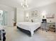 Bedroom features a large bed, desk area, and closet at 3610 Mill Pond Rd, Charlotte, NC 28226