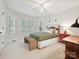 Bright bedroom with white walls, neutral accents, and plenty of natural light at 3610 Mill Pond Rd, Charlotte, NC 28226