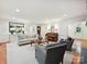 Cozy living room featuring hardwood floors, neutral tones, and natural light at 3610 Mill Pond Rd, Charlotte, NC 28226