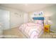 Bright bedroom with pink decor, unicorn themed wall art and plush carpet at 3868 Maxwell Henry Nw Ln, Conover, NC 28613