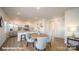 Eat-in kitchen boasts stainless steel appliances, light granite countertops, and island with breakfast bar at 3868 Maxwell Henry Nw Ln, Conover, NC 28613