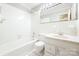 Bright bathroom featuring a shower-tub combination and white vanity at 415 Princeton Dr, Salisbury, NC 28144