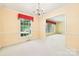 Inviting dining room with carpet, light walls, chandelier, and scenic outdoor view at 415 Princeton Dr, Salisbury, NC 28144
