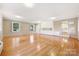 Spacious living room with hardwood floors, built-in cabinets, and large windows at 415 Princeton Dr, Salisbury, NC 28144