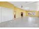Spacious living room with large closets, tile floor, and french doors to another living space at 415 Princeton Dr, Salisbury, NC 28144