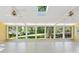 Sunroom filled with natural light from large windows and skylights at 415 Princeton Dr, Salisbury, NC 28144
