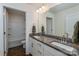 Bathroom with double vanity, granite countertop, and tiled shower at 424 Preston Rd, Mooresville, NC 28117