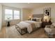 Charming bedroom featuring large windows, plush carpeting, and modern furnishings at 424 Preston Rd, Mooresville, NC 28117