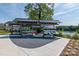A boat storage area displays kayaks and canoes near a lake, offering opportunities for waterfront recreation at 424 Preston Rd, Mooresville, NC 28117