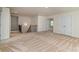 Large bonus room with staircase, ample space, and natural light at 424 Preston Rd, Mooresville, NC 28117